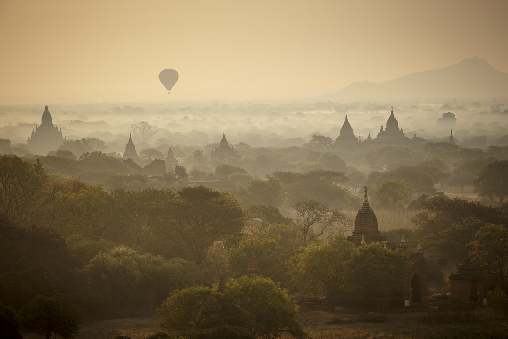 Balloons and mist rising over Bagan